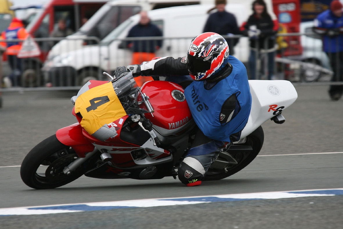 NABD member Big Mitch (left arm paralysed due to BPI) racing on the Isle of Man